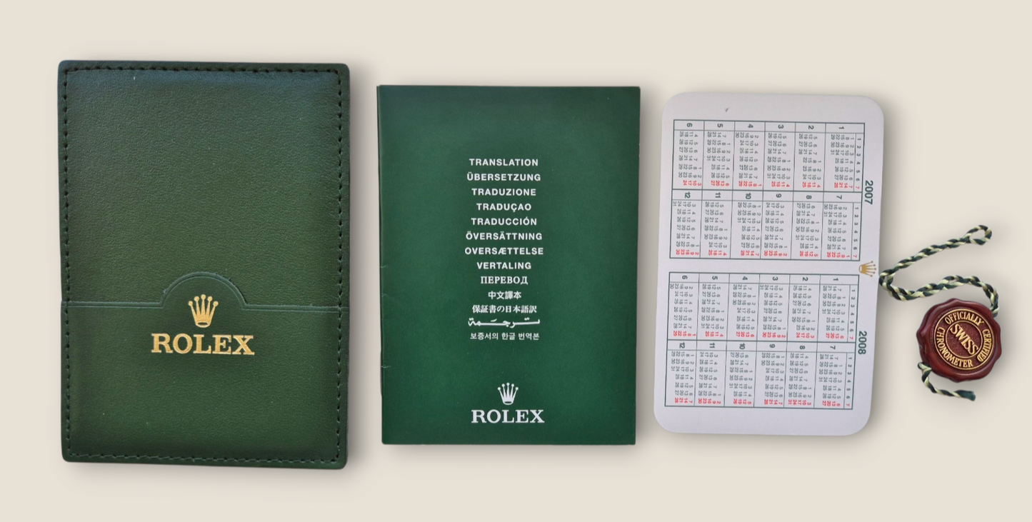 Rolex Submariner instruction manual 2008 594.52 Eng + Rolex wallet, Swing tag & Calendar card