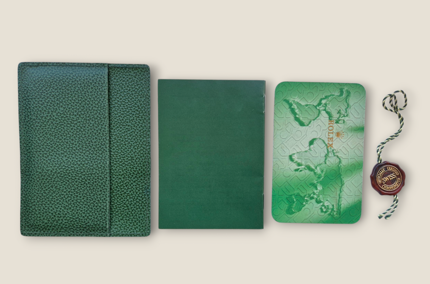 Rolex Submariner instruction manual 2002 594.52 Eng + Rolex wallet, Swing tag & Calendar card