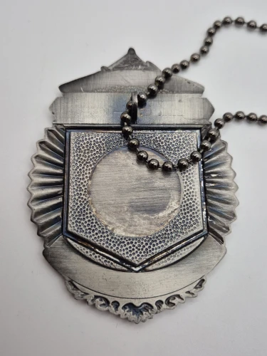 Breitling Baselworld 2012 Security Clearance shield necklace