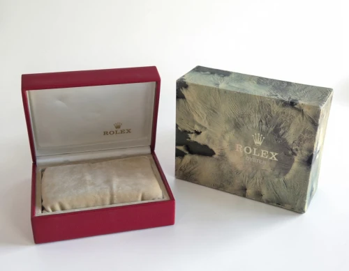 Rolex watch box Dark red with beige inner lining and outer box 14.00.02 Circa 1990s